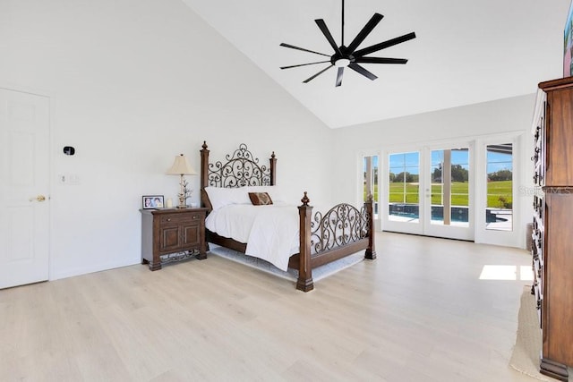 5913 Masters Blvd, Orlando, FL 32819 - bedroom featuring high vaulted ceiling, access to outside, light wood finished floors, and a ceiling fan