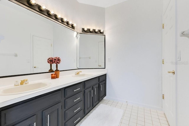 5913 Masters Blvd, Orlando, FL 32819 - full bathroom featuring double vanity, tile patterned floors, and baseboards