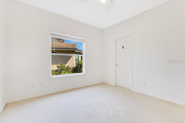 5913 Masters Blvd, Orlando, FL 32819 - carpeted spare room with baseboards and ceiling fan