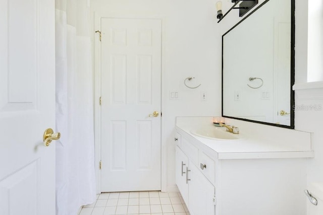 5913 Masters Blvd, Orlando, FL 32819 - full bathroom featuring vanity and tile patterned flooring