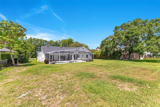5913 Masters Blvd, Orlando, FL 32819 - back of property with glass enclosure and a patio