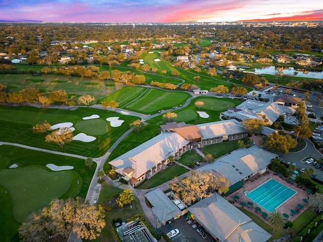 5913 Masters Blvd, Orlando, FL 32819 - aerial view at dusk of view of golf course, a water view, and a residential view