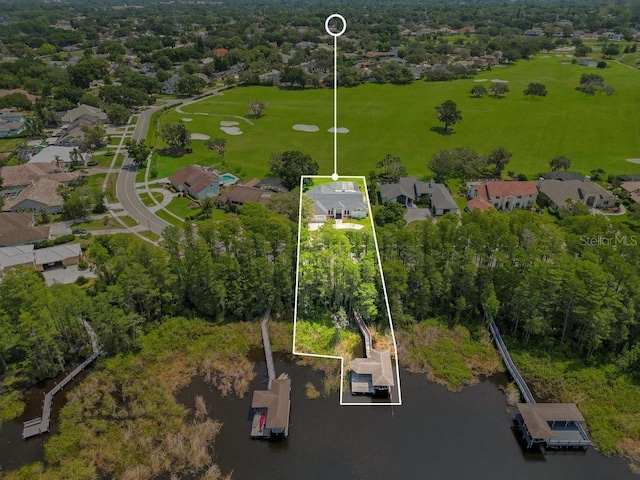 5913 Masters Blvd, Orlando, FL 32819 - aerial perspective of suburban area featuring property parcel outlined and a large body of water