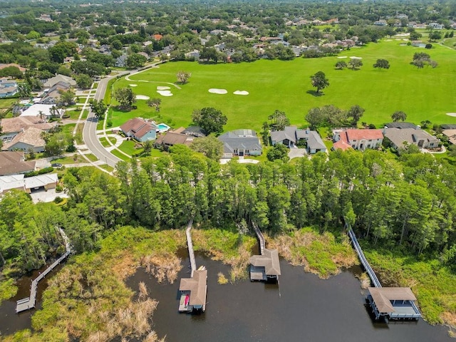 5913 Masters Blvd, Orlando, FL 32819 - aerial overview of property's location featuring a nearby body of water, nearby suburban area, and a tree filled landscape