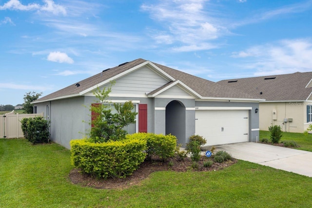 868 Brooklet Dr, Davenport, FL 33837 - single story home with driveway, a garage, stucco siding, and a shingled roof
