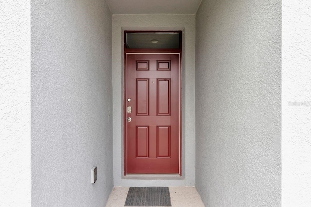 868 Brooklet Dr, Davenport, FL 33837 - entrance to property featuring stucco siding