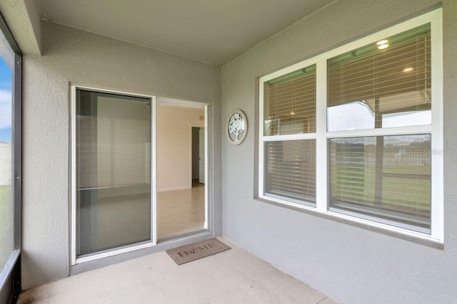 868 Brooklet Dr, Davenport, FL 33837 - doorway to property with stucco siding