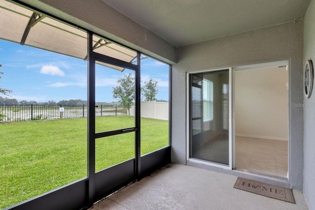 868 Brooklet Dr, Davenport, FL 33837 - unfurnished sunroom featuring a water view