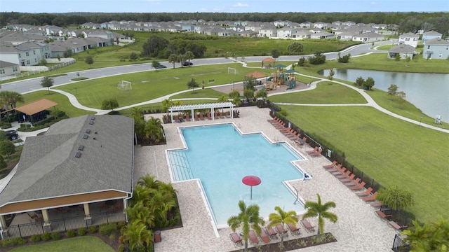 868 Brooklet Dr, Davenport, FL 33837 - community pool featuring a pergola, a water view, and a residential view
