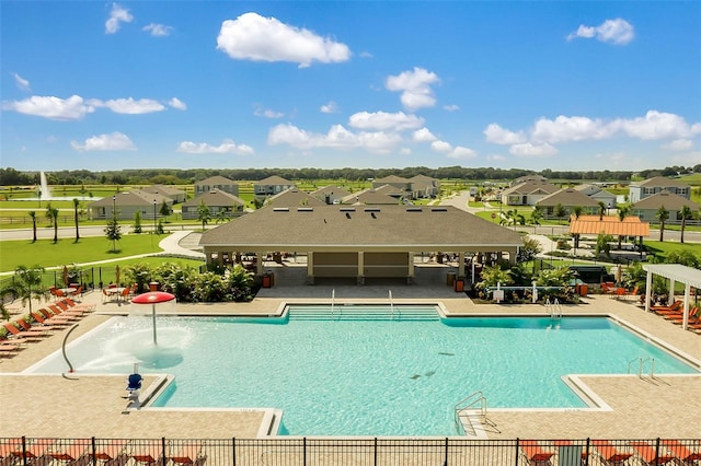 868 Brooklet Dr, Davenport, FL 33837 - community pool with a gazebo, a residential view, and a patio
