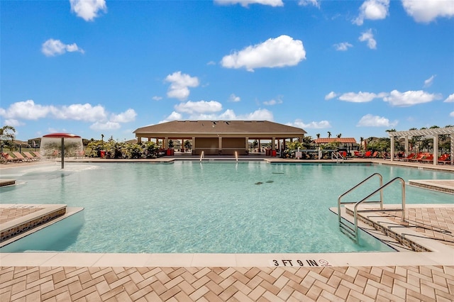 868 Brooklet Dr, Davenport, FL 33837 - community pool featuring a pergola and a patio area