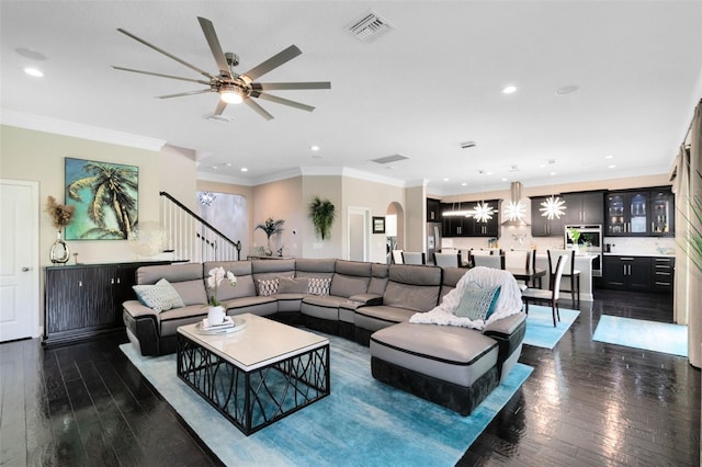 12530 Climbing Vine Ct, Windermere, FL 34786 - living area with dark wood-type flooring, a ceiling fan, recessed lighting, ornamental molding, and stairs