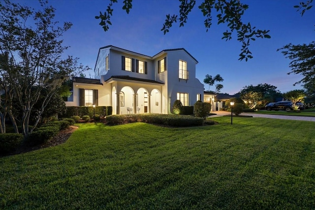 521 S Phelps Ave, Winter Park, FL 32789 - view of front of home featuring stucco siding and a front lawn