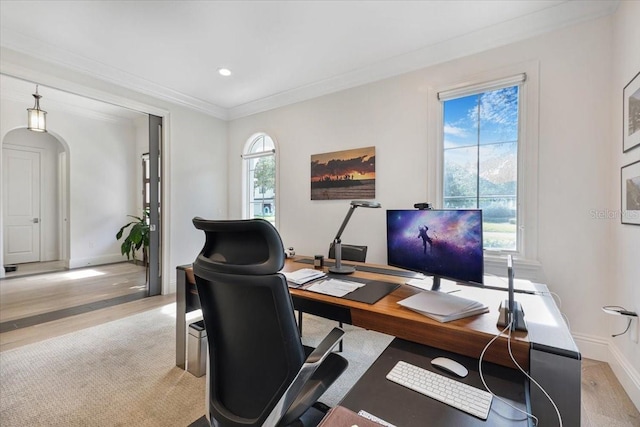 521 S Phelps Ave, Winter Park, FL 32789 - office area with baseboards, light wood-style flooring, crown molding, recessed lighting, and arched walkways