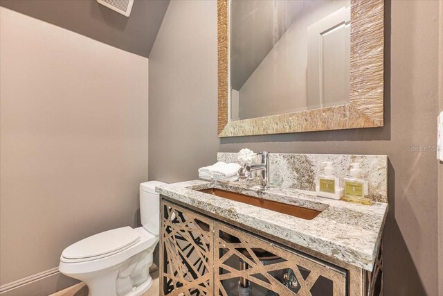521 S Phelps Ave, Winter Park, FL 32789 - bathroom with toilet and vanity