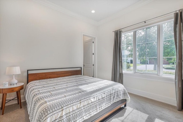 521 S Phelps Ave, Winter Park, FL 32789 - carpeted bedroom featuring crown molding, multiple windows, and baseboards
