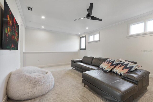 521 S Phelps Ave, Winter Park, FL 32789 - carpeted living room featuring crown molding, recessed lighting, plenty of natural light, a ceiling fan, and baseboards