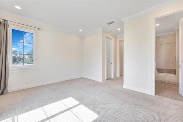 521 S Phelps Ave, Winter Park, FL 32789 - unfurnished bedroom featuring recessed lighting, light carpet, baseboards, crown molding, and ensuite bath