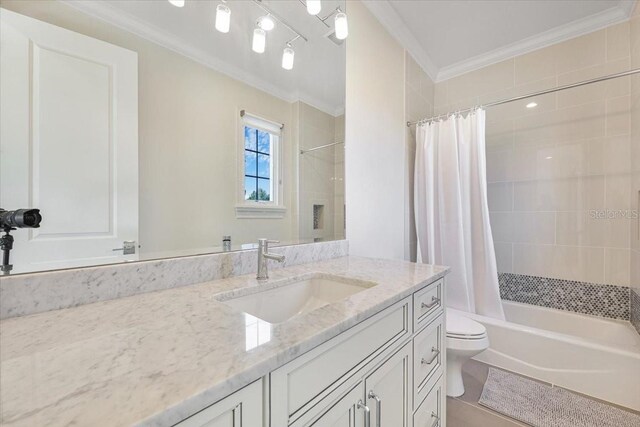 521 S Phelps Ave, Winter Park, FL 32789 - full bathroom featuring ornamental molding, toilet, vanity, and shower / bathtub combination with curtain