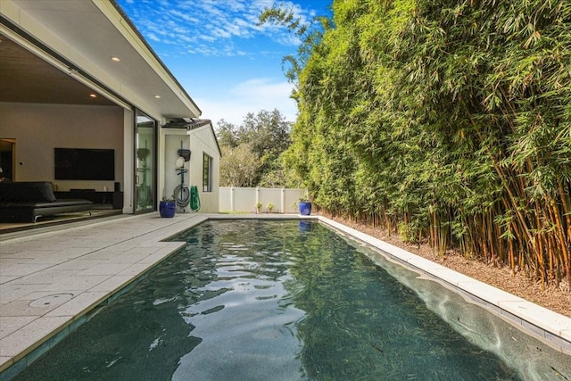 521 S Phelps Ave, Winter Park, FL 32789 - view of swimming pool with a patio area and a fenced backyard