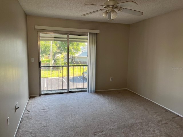 4596 Pheasant Run Dr Unit C, Orlando, FL 32808 - carpeted spare room with ceiling fan, a textured ceiling, and baseboards
