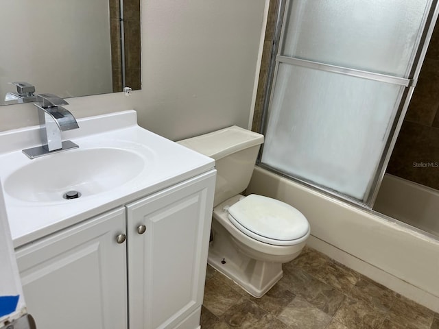 4596 Pheasant Run Dr Unit C, Orlando, FL 32808 - bathroom with vanity, toilet, and enclosed tub / shower combo