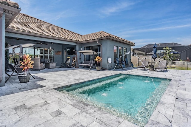 29043 Picana Ln, Wesley Chapel, FL 33543 - view of pool featuring a fenced backyard, a patio area, and a ceiling fan