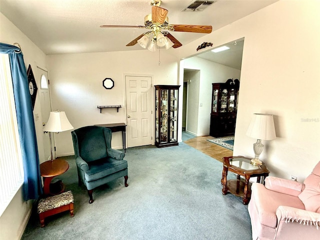 204 Holland St, Lake Wales, FL 33859 - living room featuring ceiling fan, carpet, and lofted ceiling
