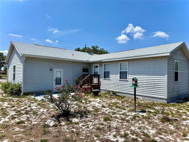 204 Holland St, Lake Wales, FL 33859 - back of house with a shingled roof