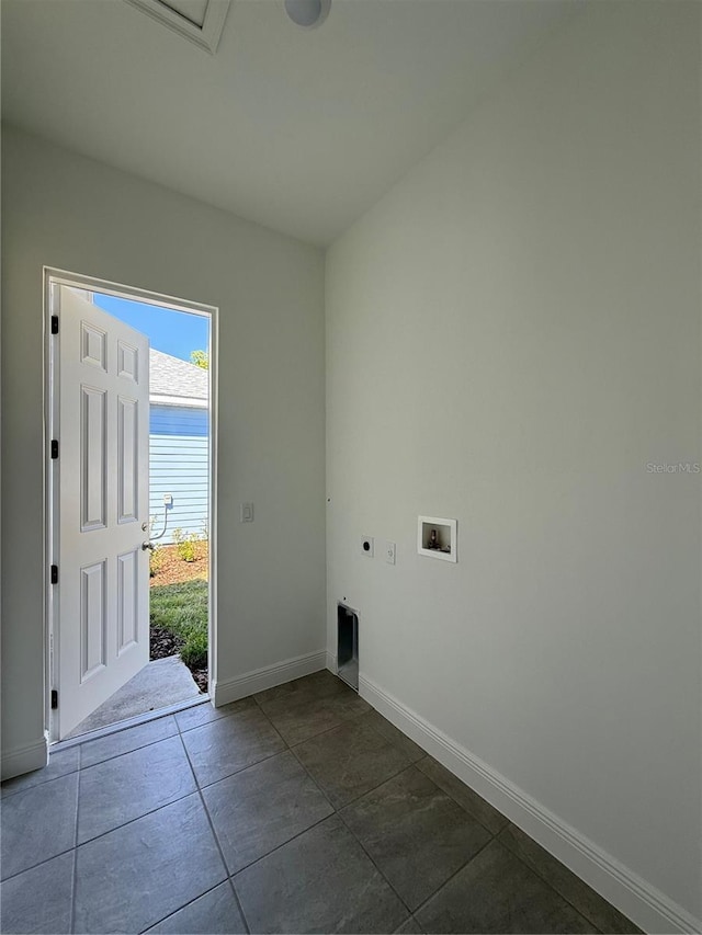 931 Azalea Walk Cir, Deland, FL 32724 - laundry area featuring hookup for an electric dryer, hookup for a washing machine, baseboards, and dark tile patterned flooring