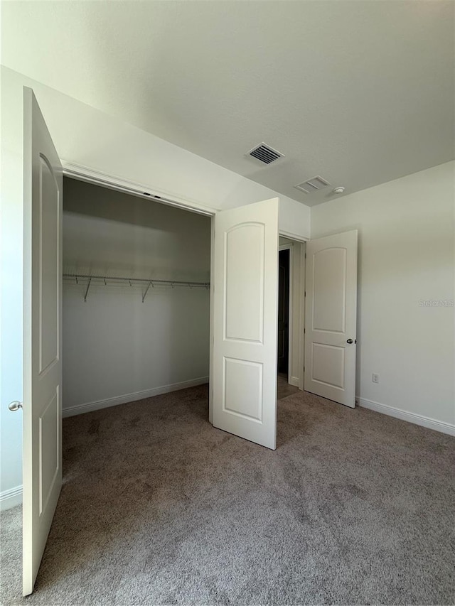931 Azalea Walk Cir, Deland, FL 32724 - unfurnished bedroom featuring carpet flooring, baseboards, and a closet