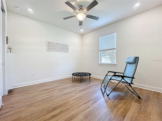 3184 Pinenut Dr, Apopka, FL 32712 - sitting room with wood finished floors, baseboards, ceiling fan, and recessed lighting