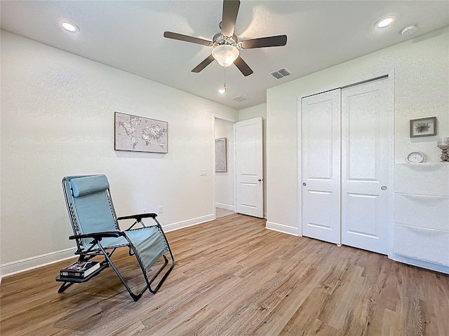 3184 Pinenut Dr, Apopka, FL 32712 - sitting room with light wood-style floors, ceiling fan, baseboards, and recessed lighting