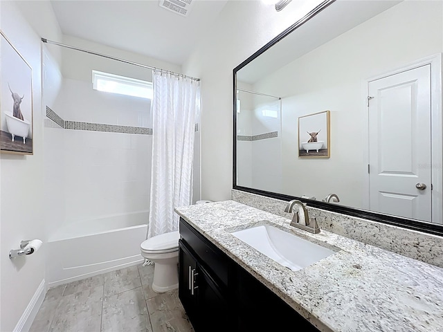 3184 Pinenut Dr, Apopka, FL 32712 - bathroom featuring vanity, toilet, shower / bath combo, and baseboards