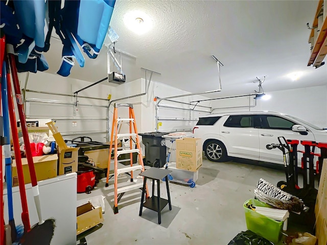 3184 Pinenut Dr, Apopka, FL 32712 - garage featuring a garage door opener