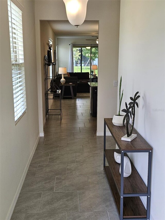 3371 Yellowtop Loop, Clermont, FL 34714 - corridor with baseboards