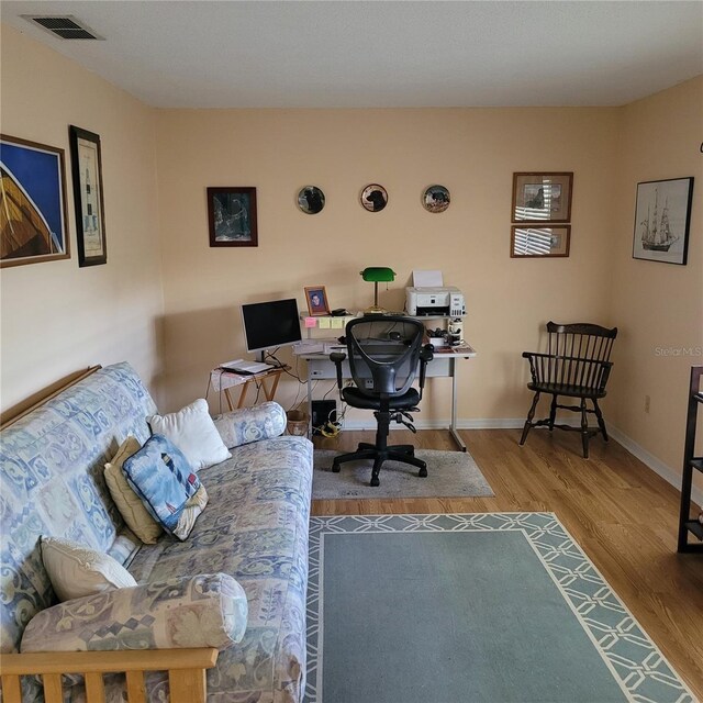 8539 Clematis Ln, Orlando, FL 32819 - office area featuring wood finished floors and baseboards