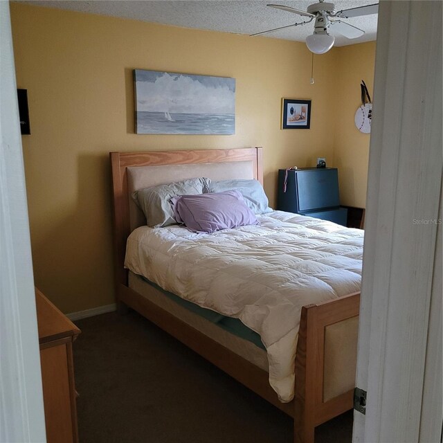 8539 Clematis Ln, Orlando, FL 32819 - bedroom with carpet and ceiling fan