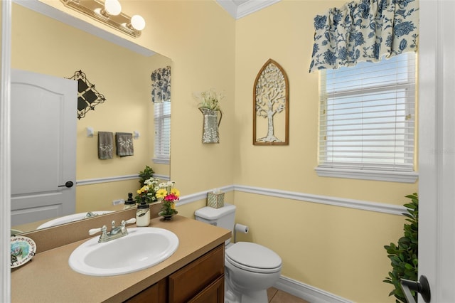 7003 Cupseed Ln, Harmony, FL 34773 - bathroom featuring vanity, toilet, crown molding, and tile patterned floors