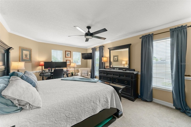 7003 Cupseed Ln, Harmony, FL 34773 - bedroom with ornamental molding, a textured ceiling, light colored carpet, baseboards, and ceiling fan