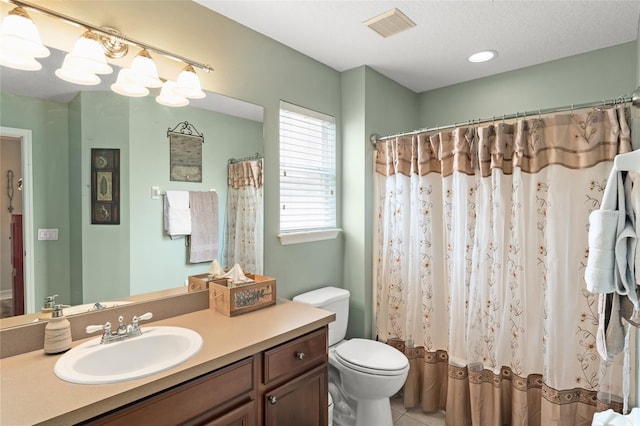 7003 Cupseed Ln, Harmony, FL 34773 - bathroom featuring toilet, vanity, tile patterned flooring, and a shower with curtain