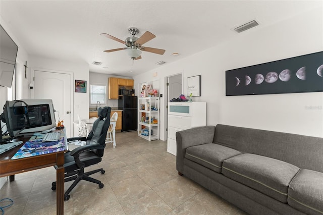 7003 Cupseed Ln, Harmony, FL 34773 - office area featuring ceiling fan, a sink, and light tile patterned floors