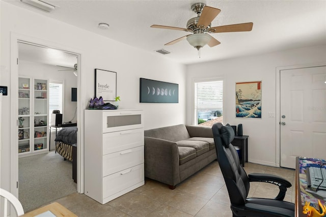 7003 Cupseed Ln, Harmony, FL 34773 - office with ceiling fan and light tile patterned floors