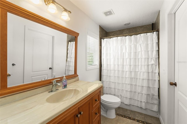 7003 Cupseed Ln, Harmony, FL 34773 - full bath featuring vanity, toilet, and tile patterned floors