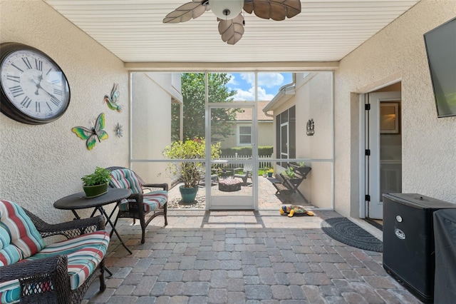 7003 Cupseed Ln, Harmony, FL 34773 - sunroom / solarium featuring ceiling fan