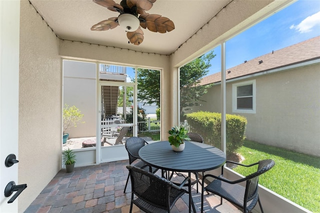 7003 Cupseed Ln, Harmony, FL 34773 - sunroom / solarium with a ceiling fan and plenty of natural light