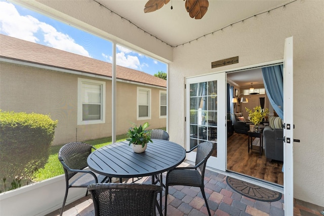 7003 Cupseed Ln, Harmony, FL 34773 - sunroom with a ceiling fan, healthy amount of natural light, and outdoor dining area