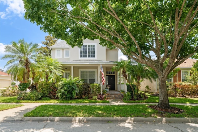 7003 Cupseed Ln, Harmony, FL 34773 - view of front facade featuring stucco siding