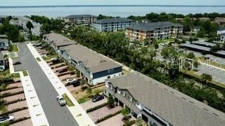 391 Cape Honeysuckle Pl, Sanford, FL 32771 - aerial view of an industrial area and a nearby body of water