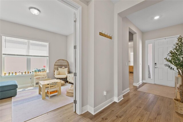 16013 Silver Brook Way, Winter Garden, FL 34787 - entryway featuring light wood finished floors and baseboards